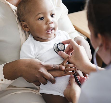 Doctor examining a baby — Pediatric Consult at Oak Ridges Medical